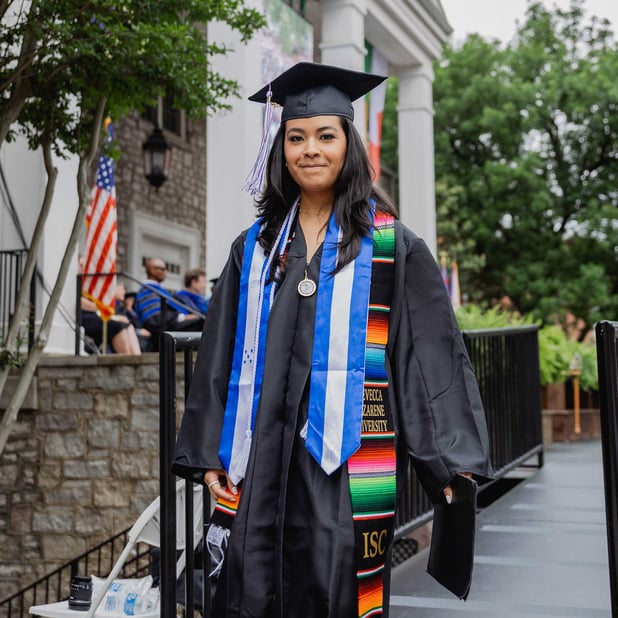 Claudia Nunez Oviedo walks at graduation.