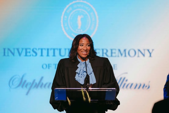 Williams speaks at her investiture ceremony.