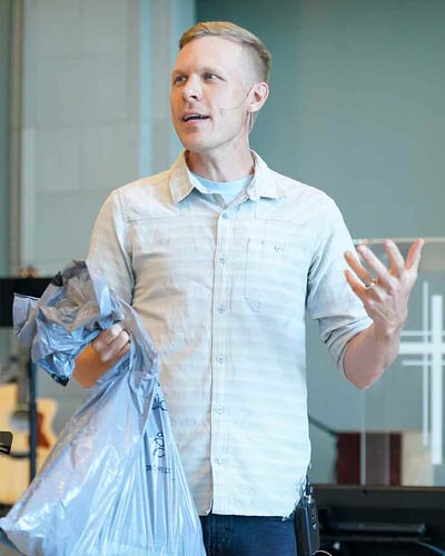 Caleb Cray speaks in chapel.